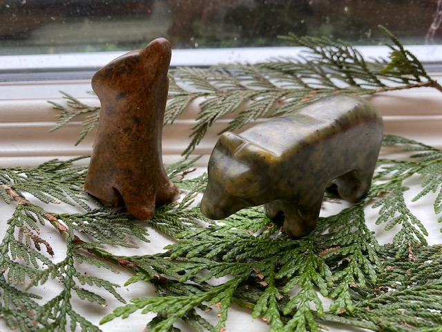 Carving of soapstone bear and wolf